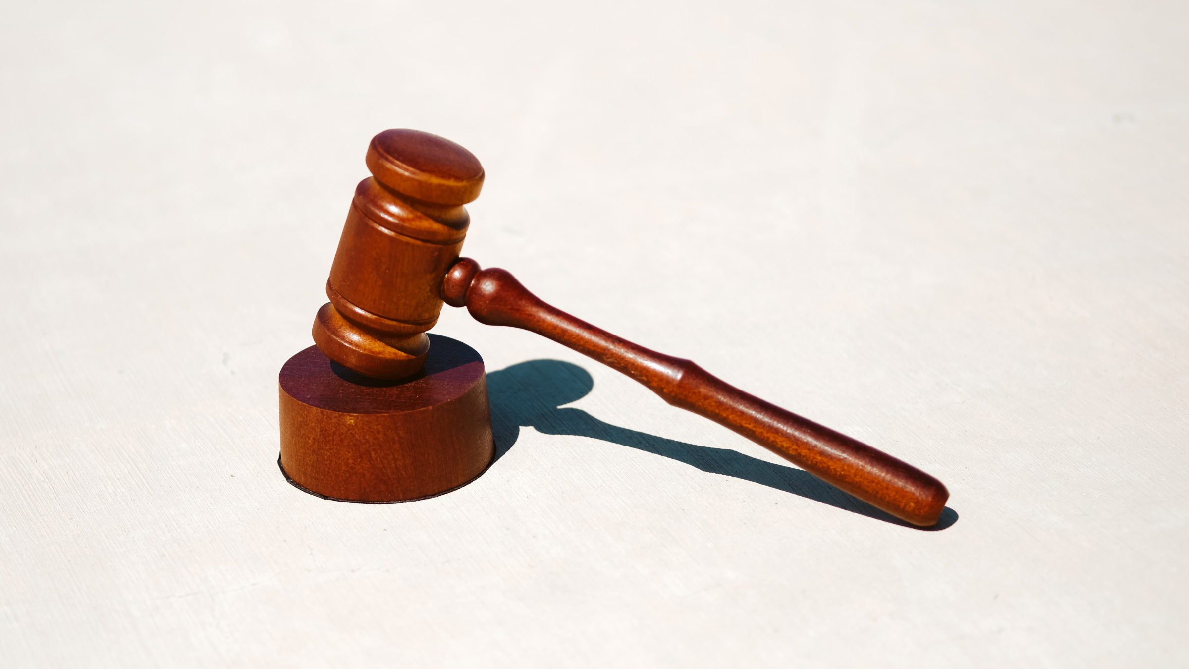 LegalA judge's gavel resting on a block, symbolizing law and legal proceedings.