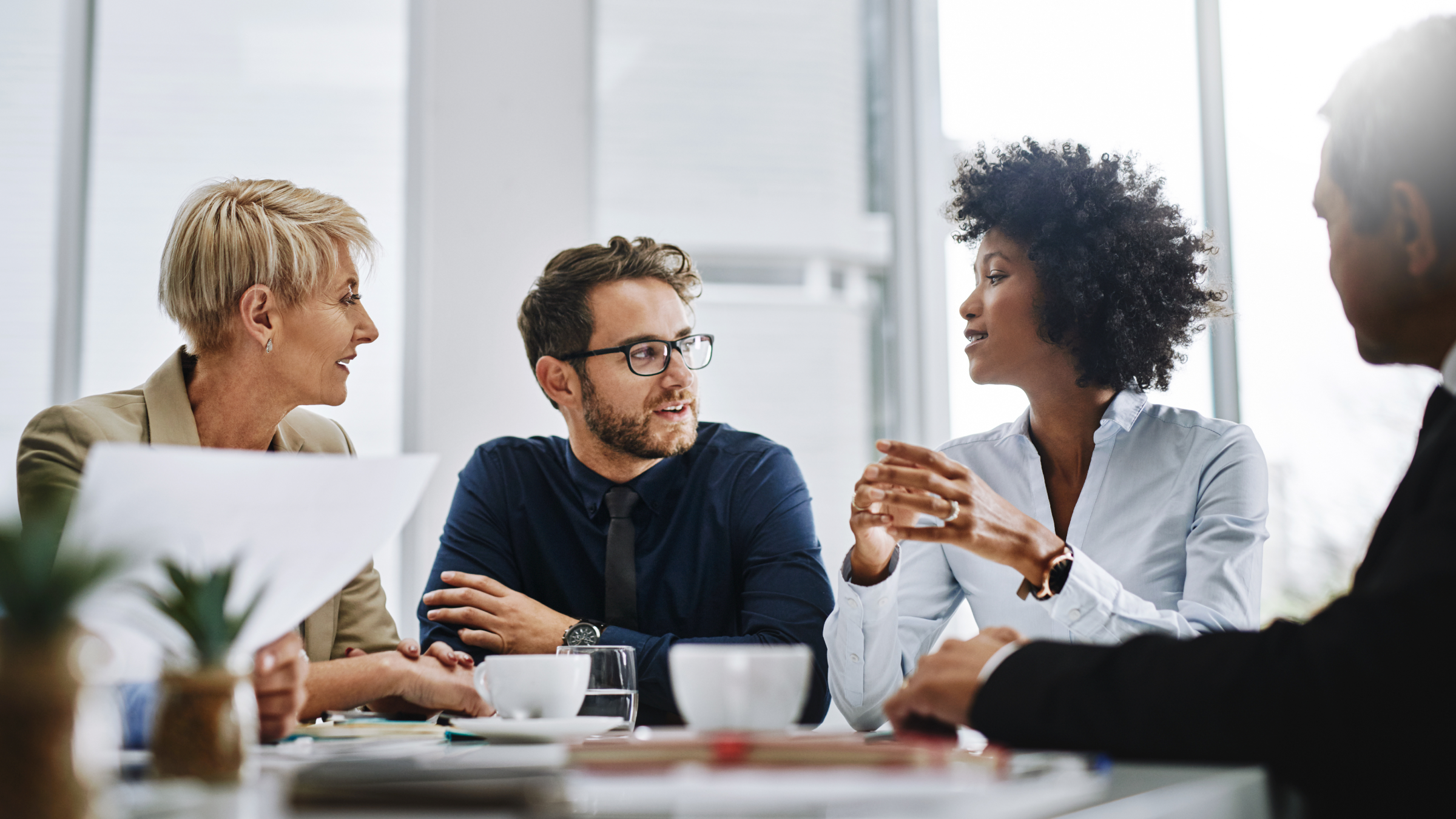 An image showing employees in a business meeting.