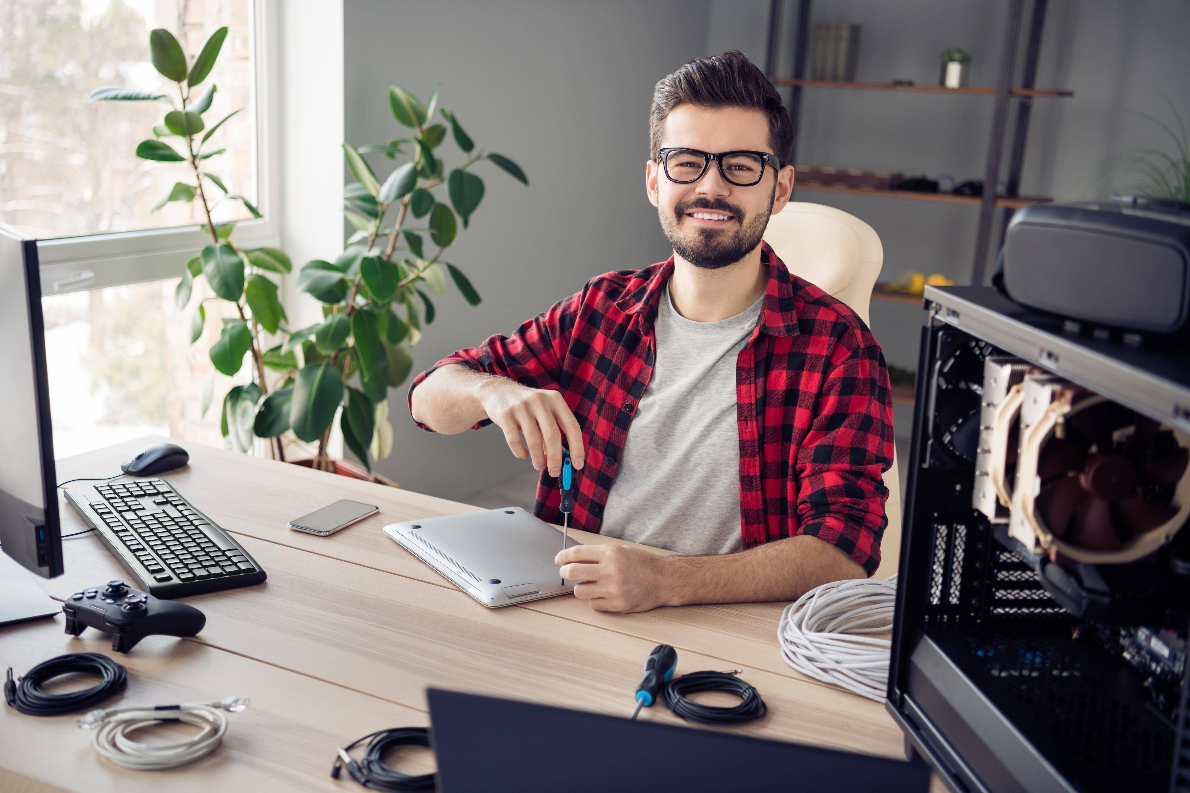 IT employee fixing a hardware issue