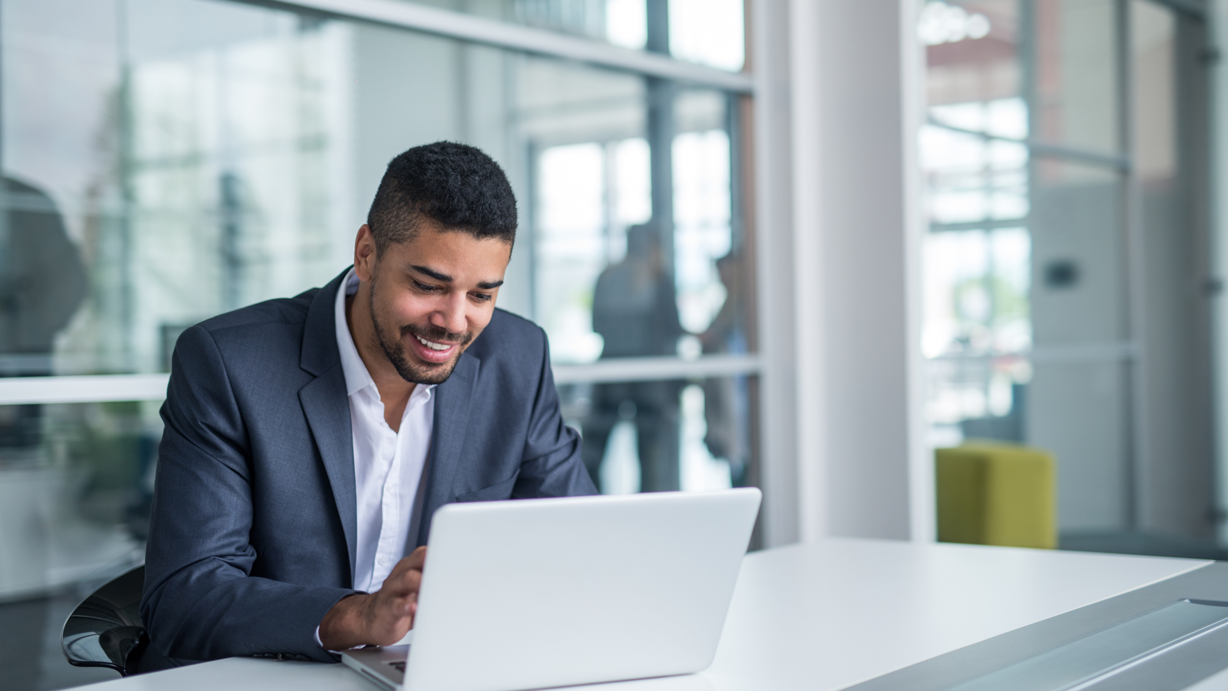 Featured image: A man working on his laptop. - Read full post: 6 Types of Cyber Attacks Your Business Should be Aware of in 2023